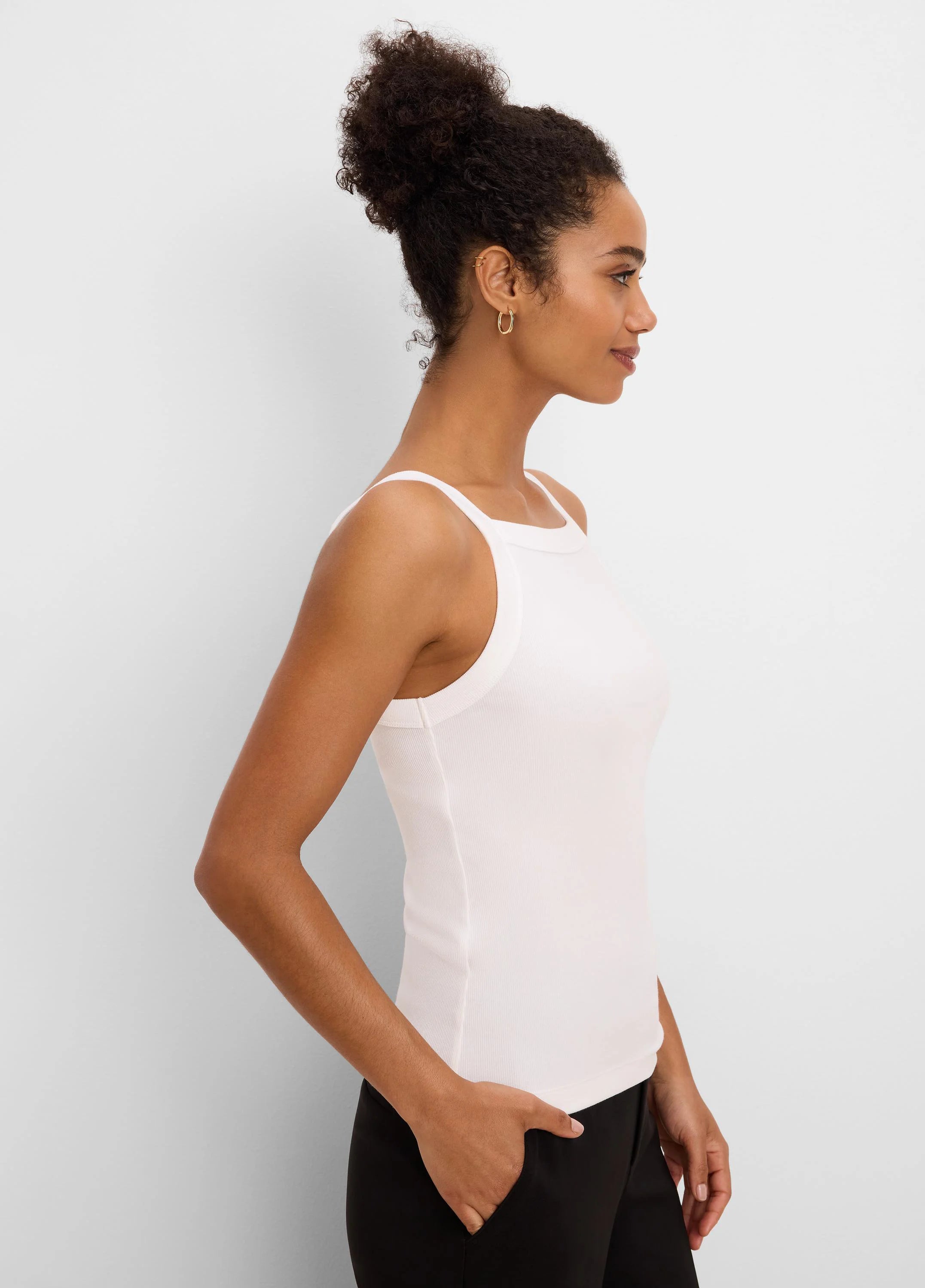 Off-white ribbed square neck tank top, shown fitted on a model.