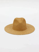 Tan woven continental hat with a creased crown and wide brim, featuring an off-white dotted weave pattern.