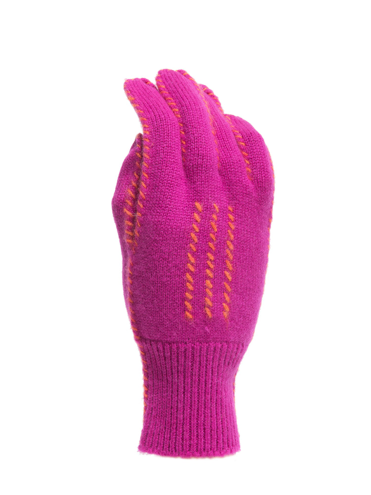 Pink cashmere gloves with orange stitching detail. Knitted texture.