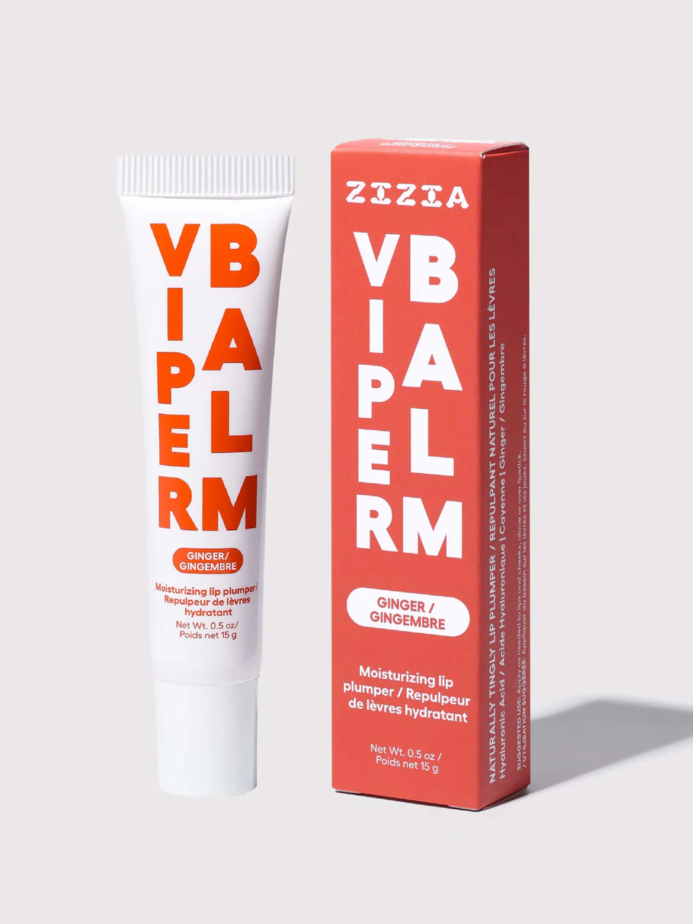 White lip balm tube with orange 'VIPERM' text, next to its red-orange box with white 'VIPERM' text. Both feature 'Ginger'...