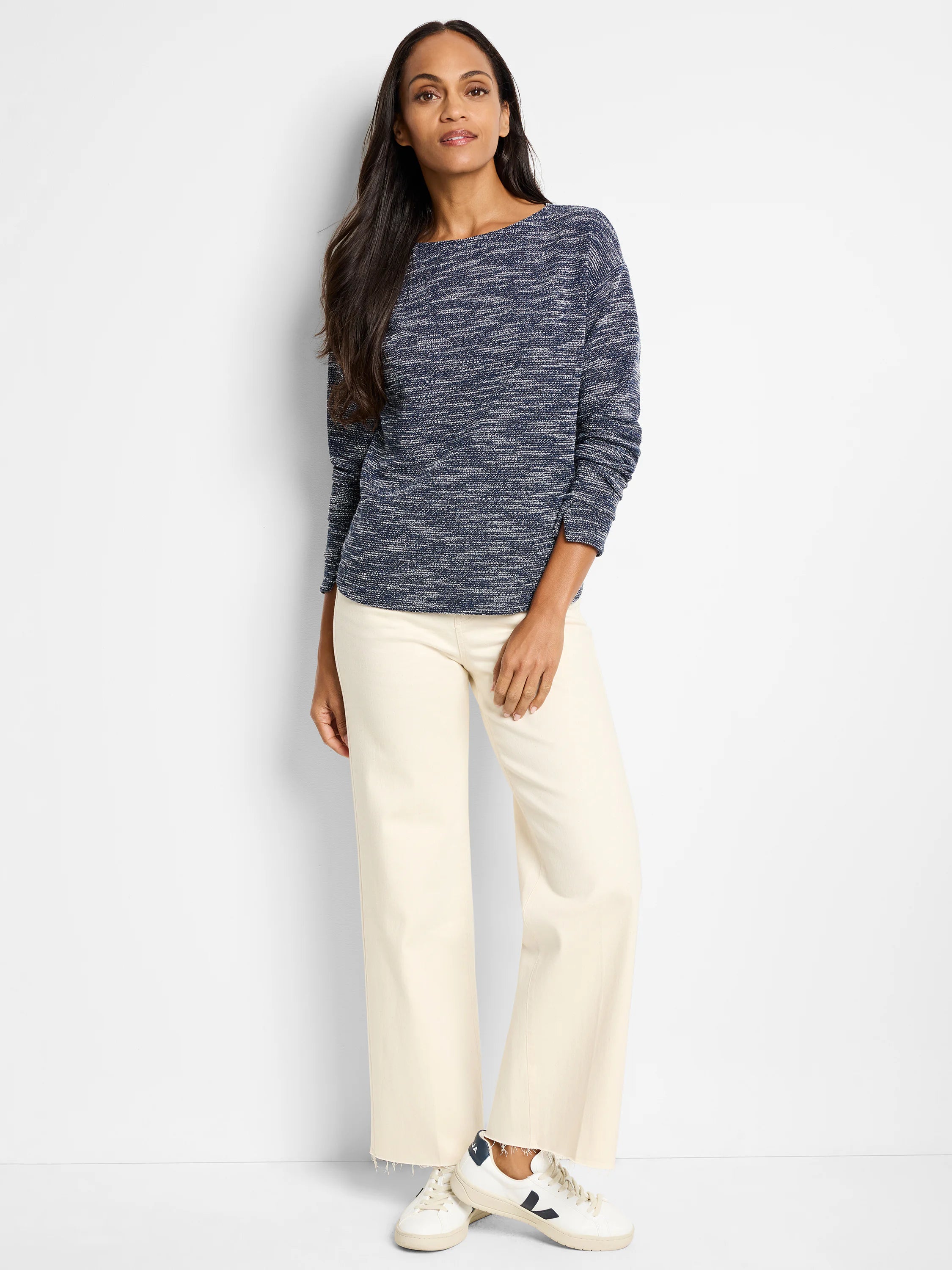 Indigo and white speckled long-sleeve boatneck top.