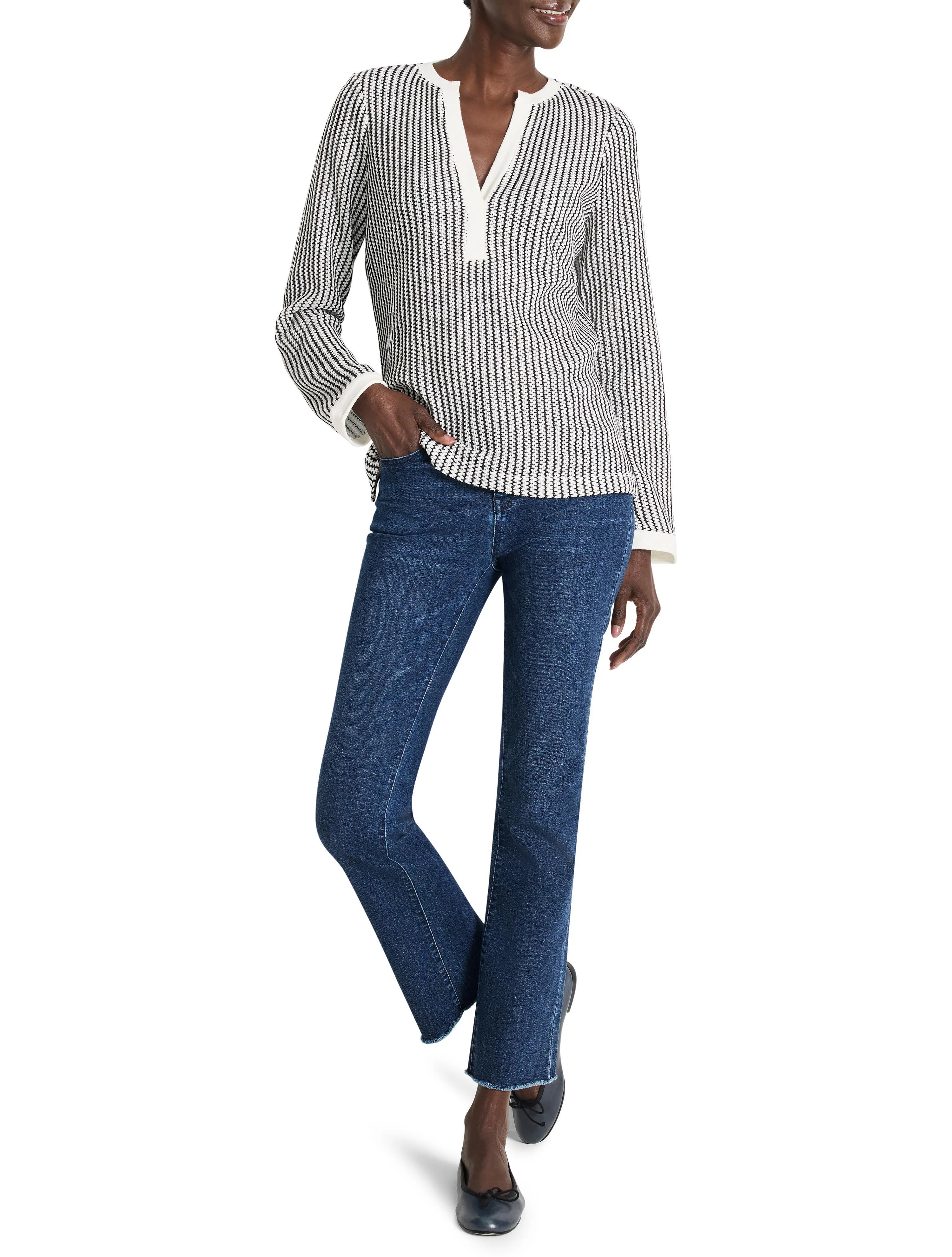 Off-white top with thin black vertical stripes, split neckline. Long sleeves, and slightly cropped.