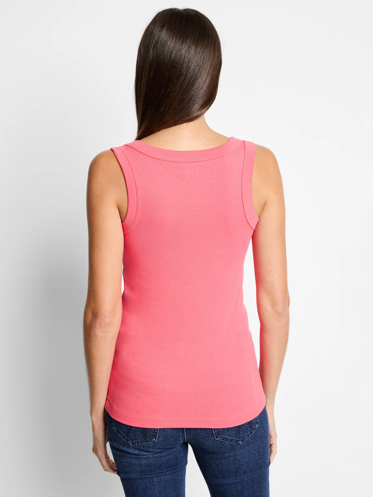 Pink ribbed scoop tank top, back view on model wearing dark jeans.