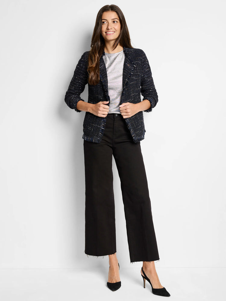 Navy blue tweed jacket with subtle flecks of white and light gold. Frayed edges. Three-quarter sleeves.