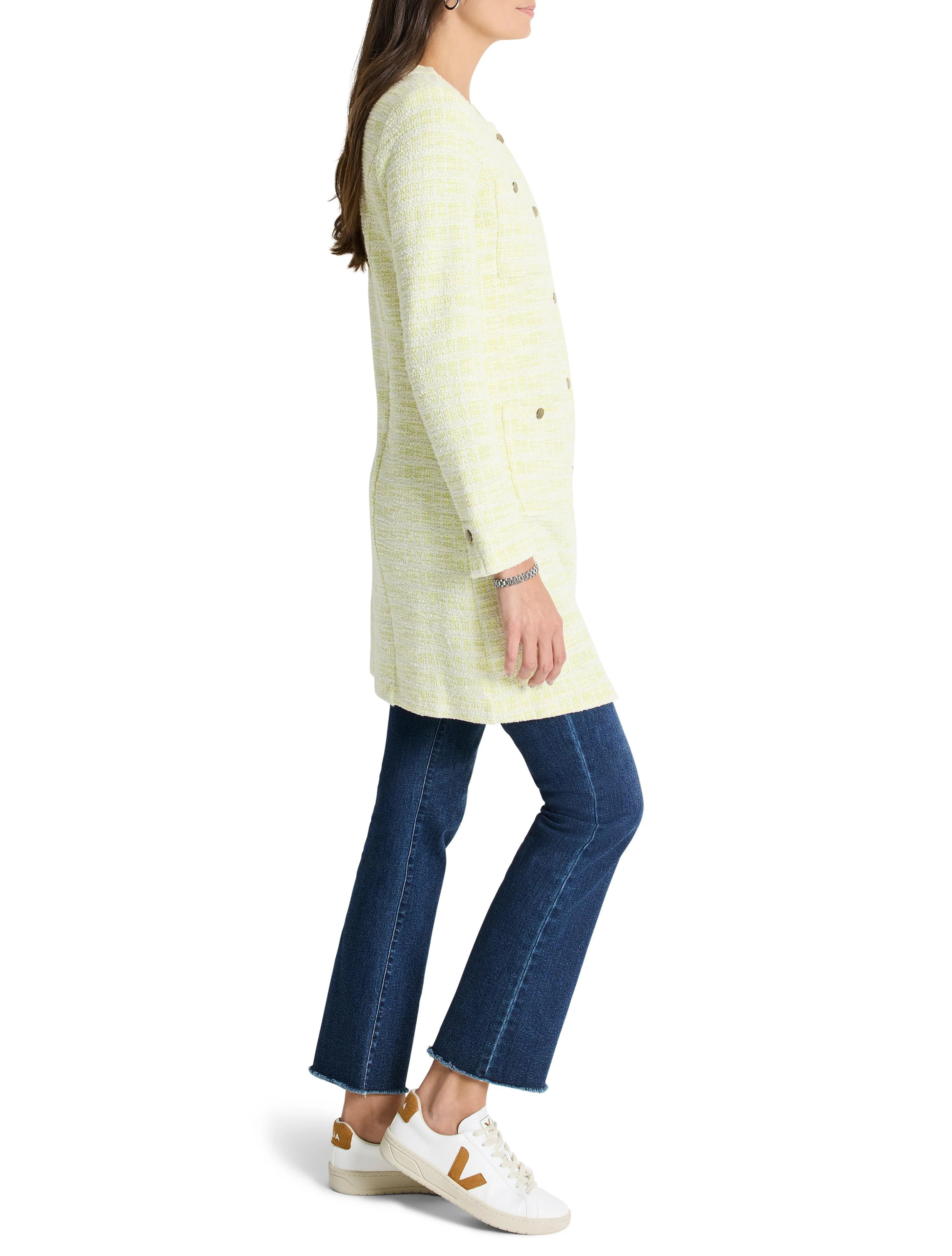 Pale yellow knit jacket with white flecks, double-breasted, long sleeves.