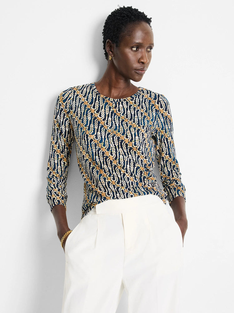Vintage batik drape top. Navy, beige, and white abstract print. Three-quarter sleeves, round neck.