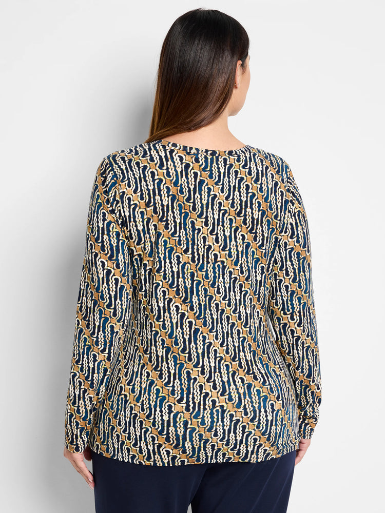 Here's alt text for the image, following your specifications:
"Long-sleeve drape top. Blue, tan, and white batik...