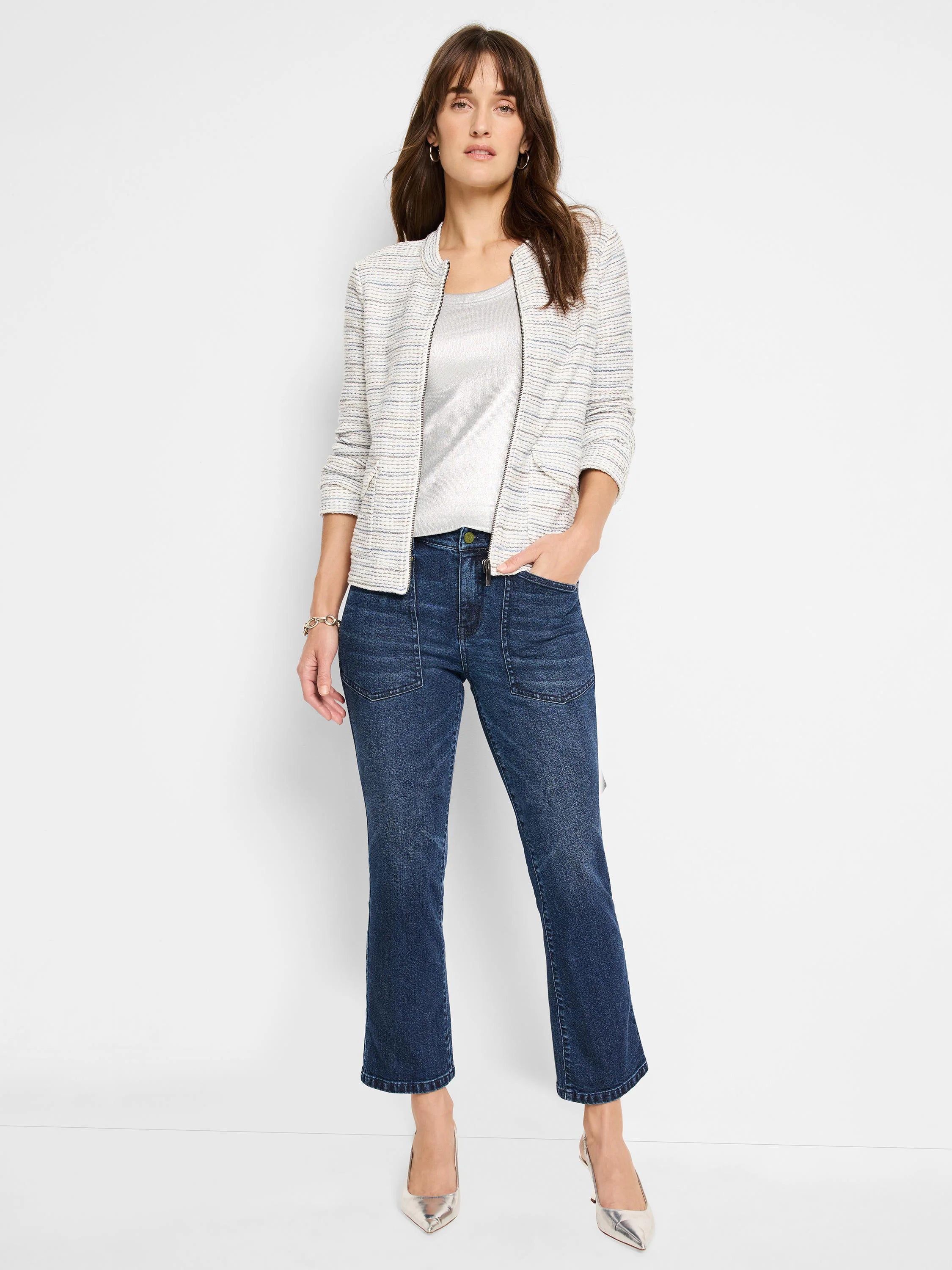 Off-white knit jacket with thin blue, beige, and gold stripes. Zipper front, and small pockets.