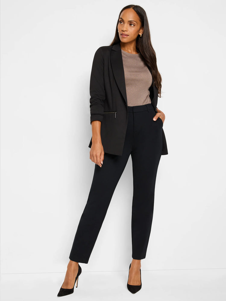 Black zip-front jacket; three-quarter sleeves; side zip detail. Model also wears black pants and shoes.