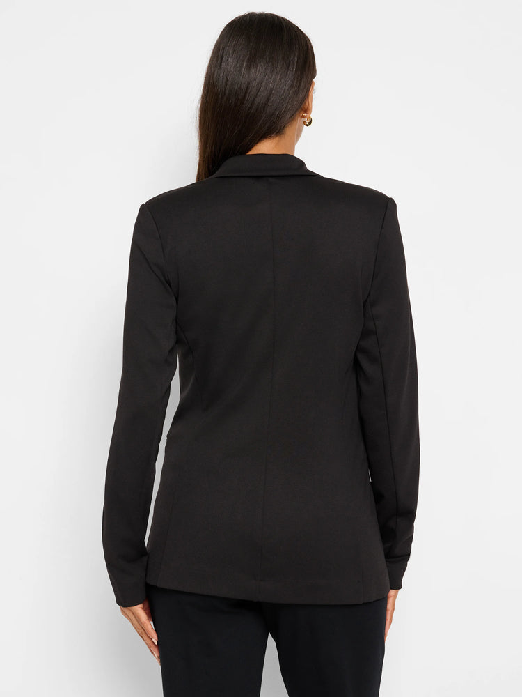 Black zip-up jacket, long sleeves, notched collar. Rear view.