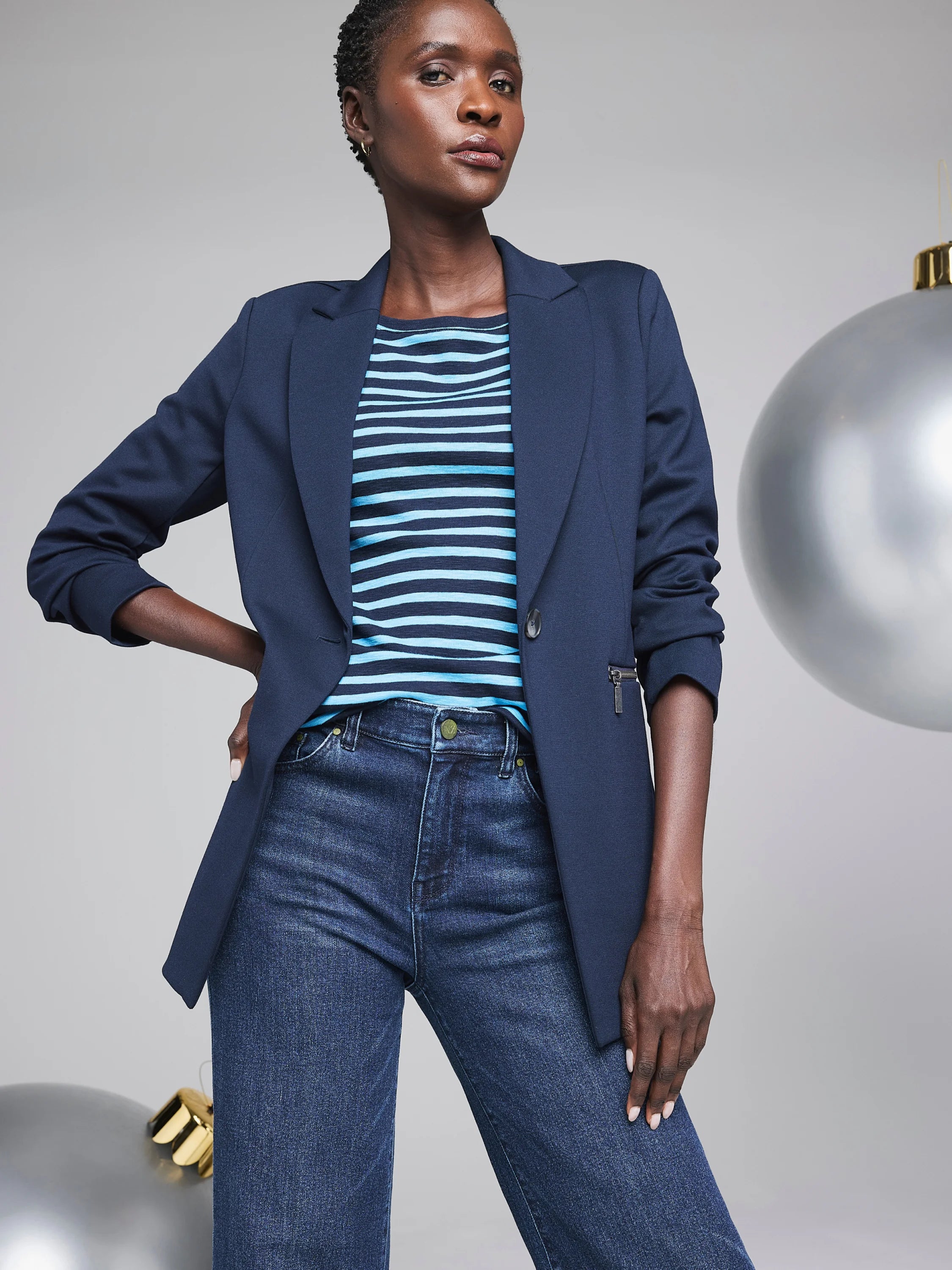 Navy blue Ponte zip jacket. Features a single button and a visible side zipper.