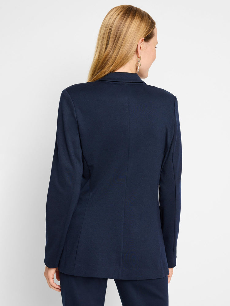 Dark navy blue zip-up jacket, shown from the back. Long sleeves, collared.