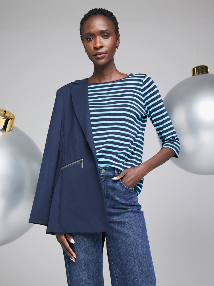 Navy blue zip-front jacket. Shown layered over a light blue and navy striped shirt.