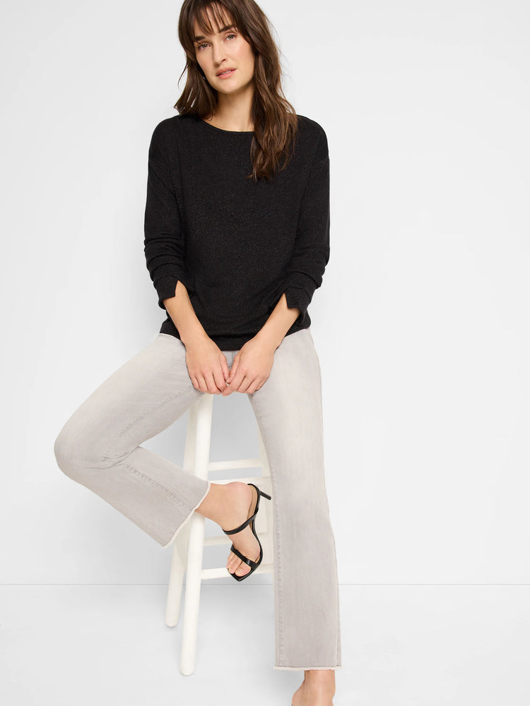 Black sparkly long-sleeve top, round neck.
