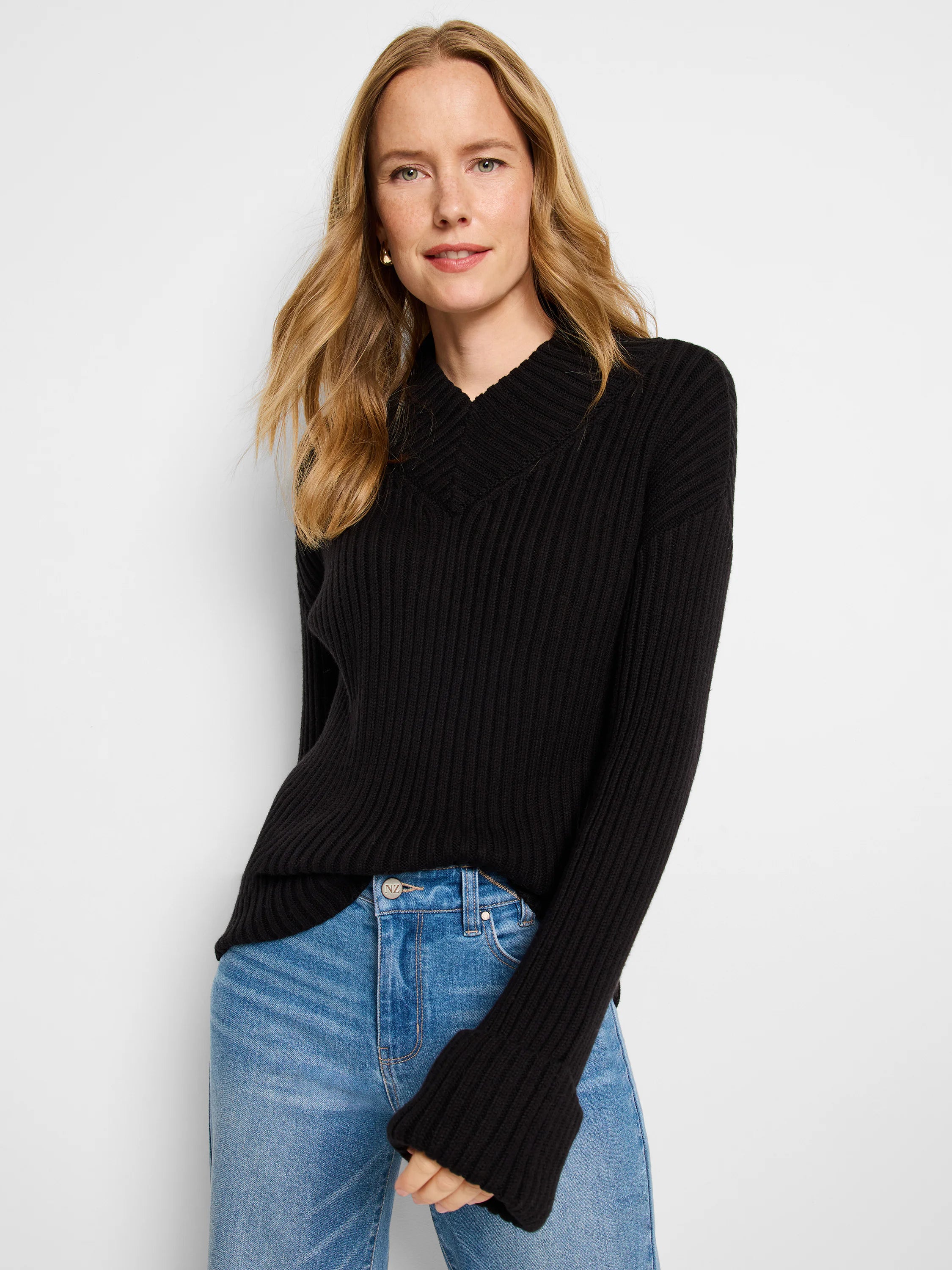 Black ribbed V-neck sweater with long sleeves and wide cuffs.