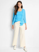 Bright blue, open-front, lightweight cardigan with 3/4 sleeves and a draped silhouette.