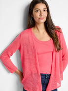 Coral pink open-front cardigan with a fine, lightweight knit texture and ribbed cuffs.
