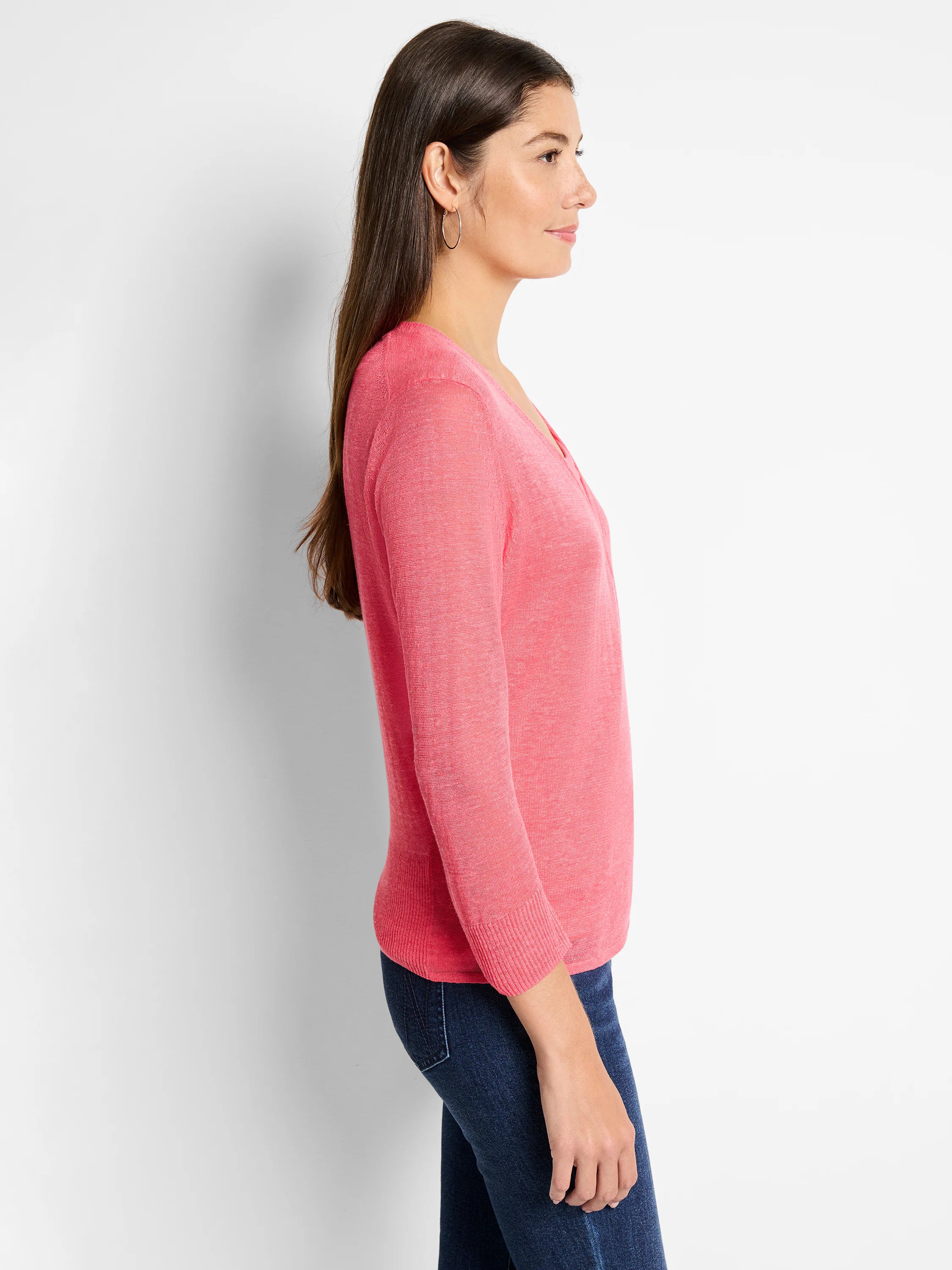 Coral pink lightweight V-neck cardigan with 3/4 sleeves, ribbed hem & cuffs, shown in side profile.