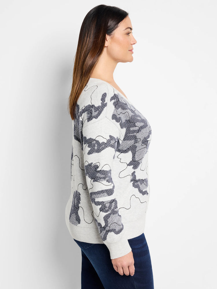 Light gray sweater with a dark gray abstract pattern. Long sleeves, relaxed fit.