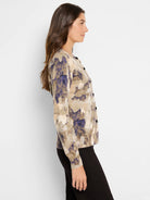 Beige, mauve, and purple abstract print cardigan.  Long sleeves, button front.