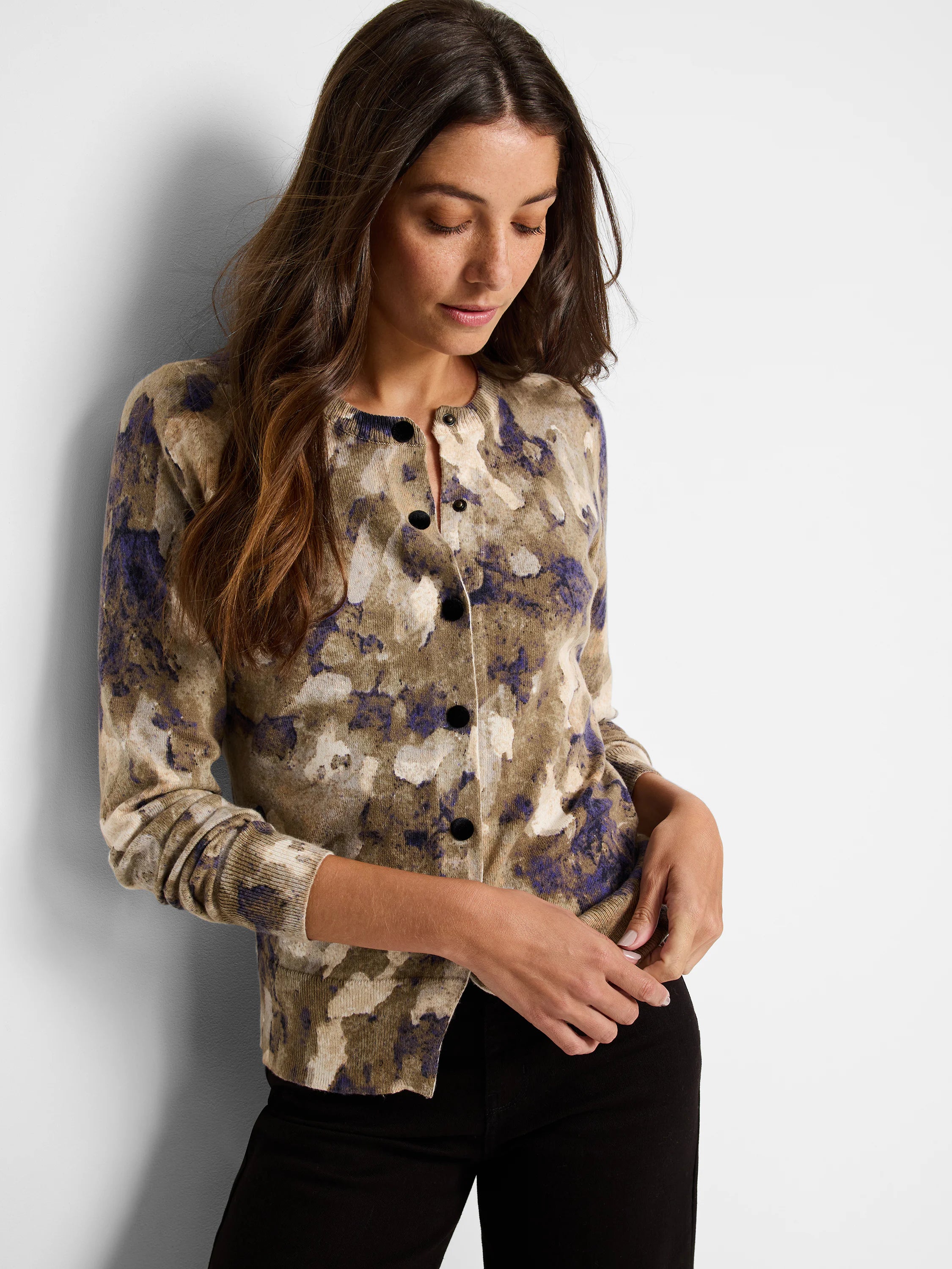 Here's alt text under 125 characters:
"Beige cardigan with purple and olive green camouflage pattern.  Long sleeves,...