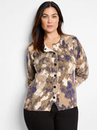 Beige, taupe, and purple abstract print cardigan.  Long sleeves, button front.  Off-white interior visible at neckline.