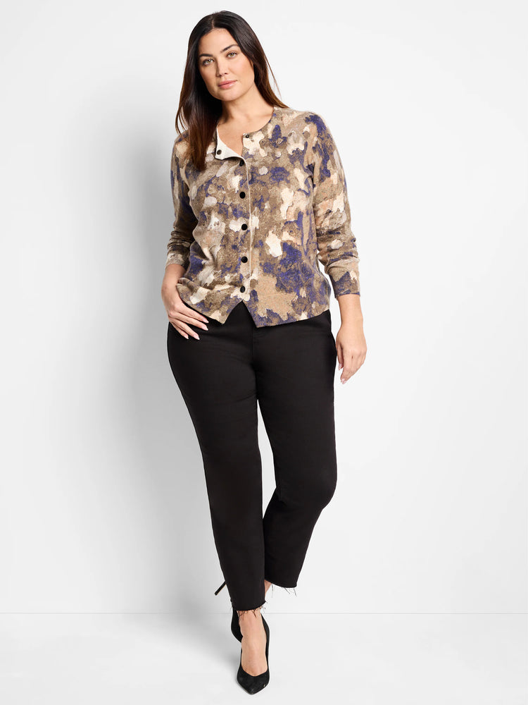 Beige cardigan with blue and white abstract print, button front.