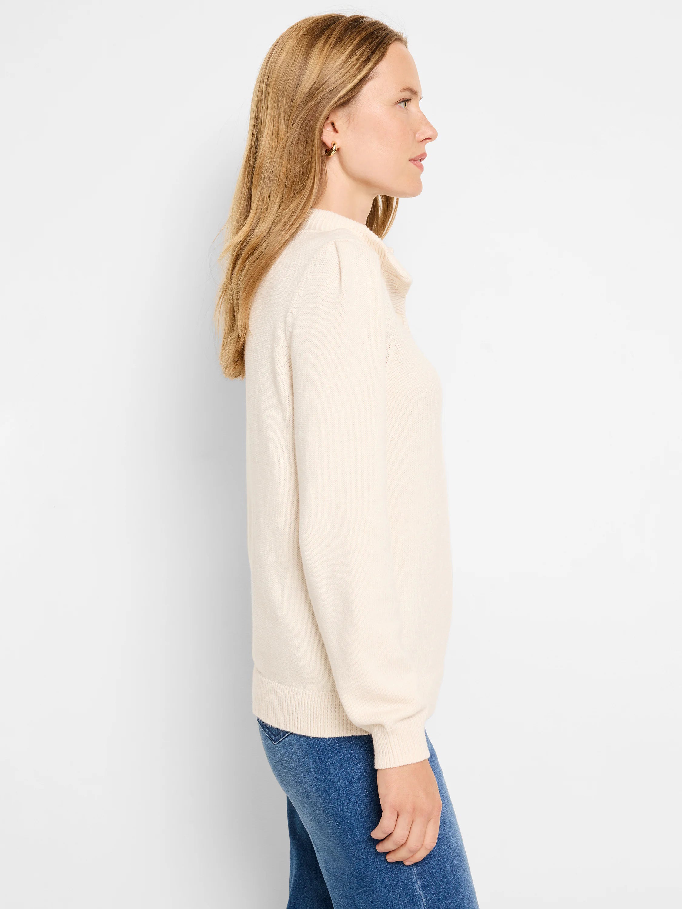 Off-white button henley sweater; long sleeves, ribbed trim.