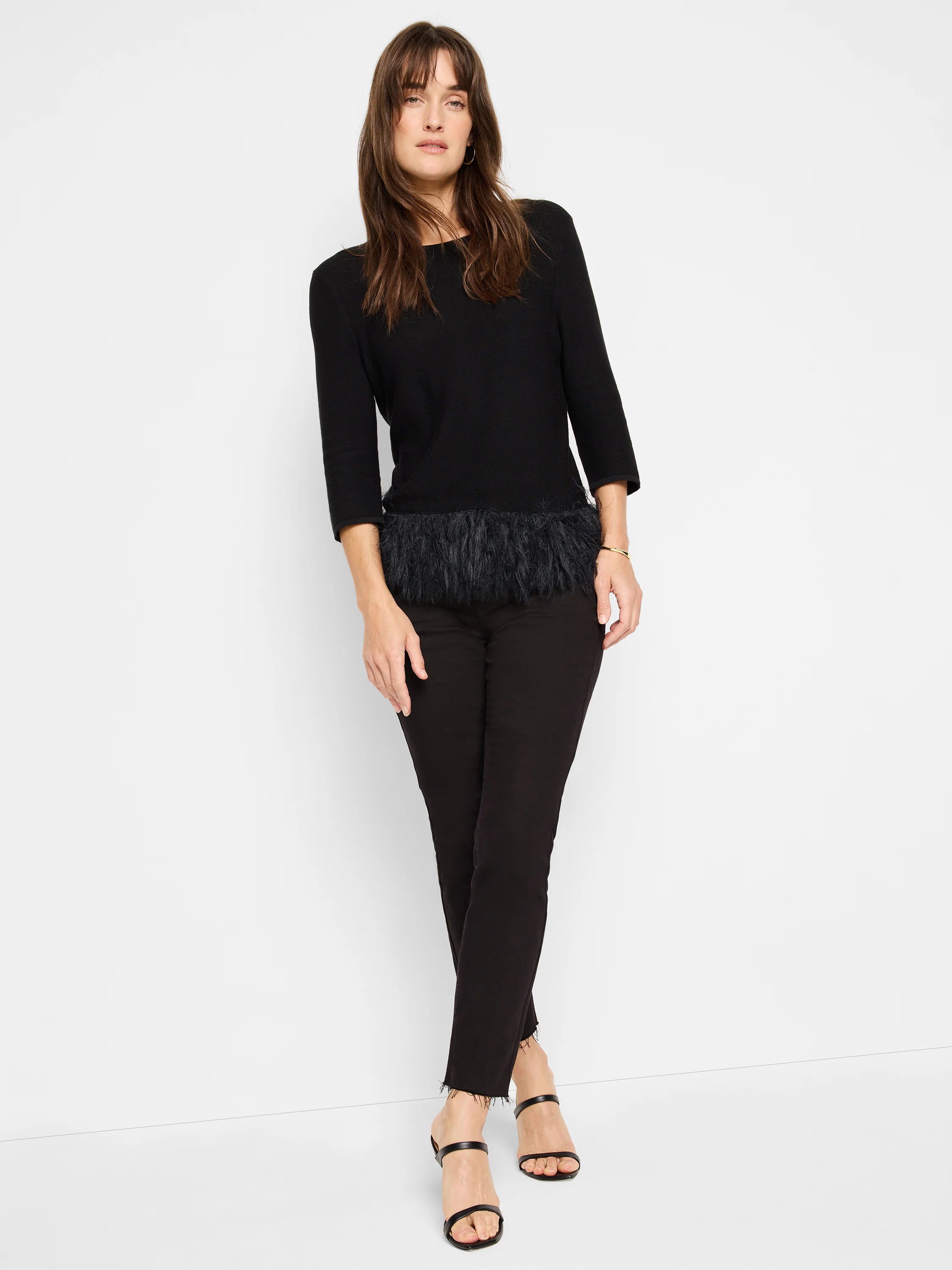 Black 3/4 sleeve sweater with a black feather fringe at the hem.