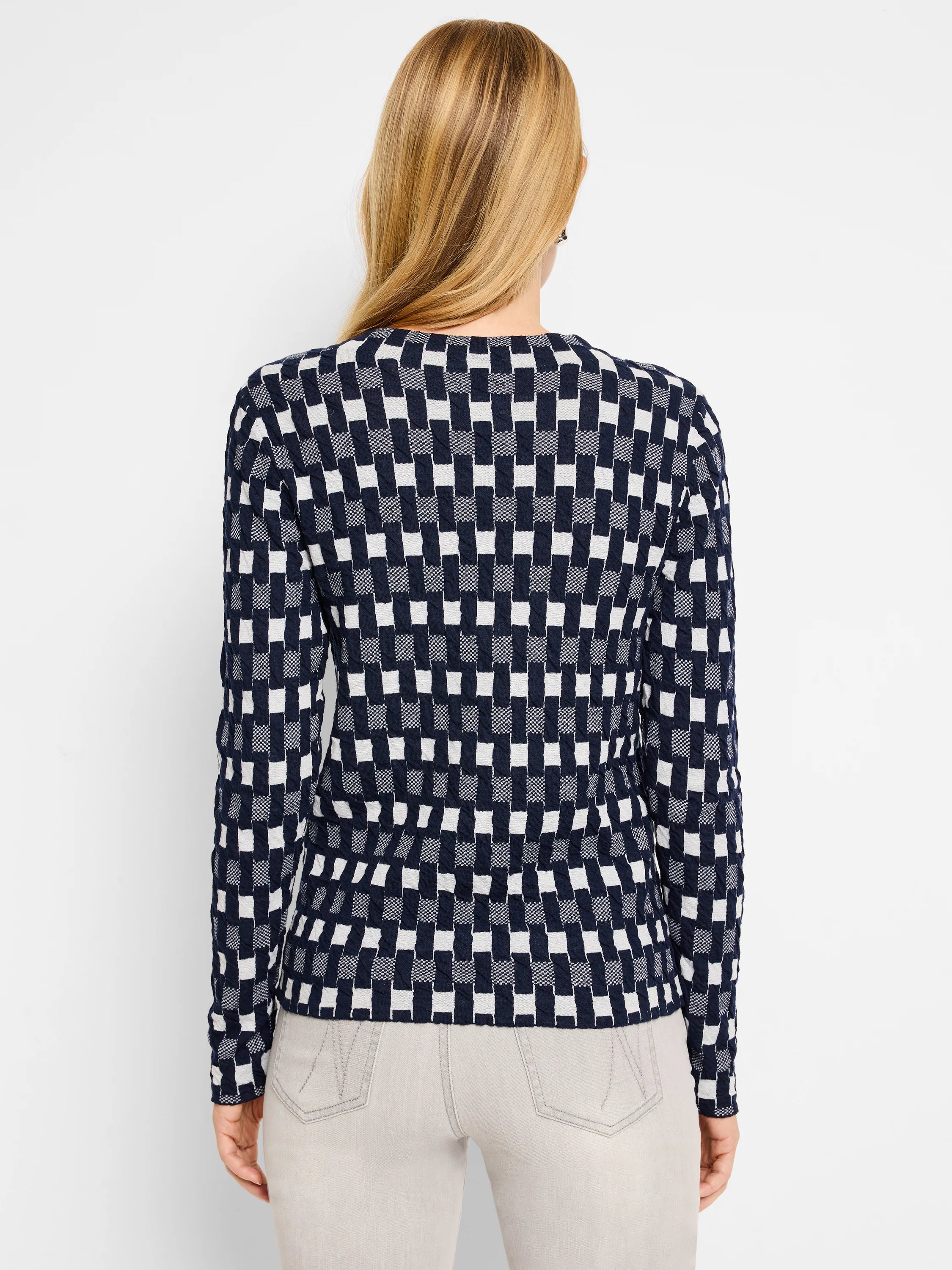 Here's alt text for the image, under 125 characters:
"Navy blue and off-white sweater tee with textured, checkered...