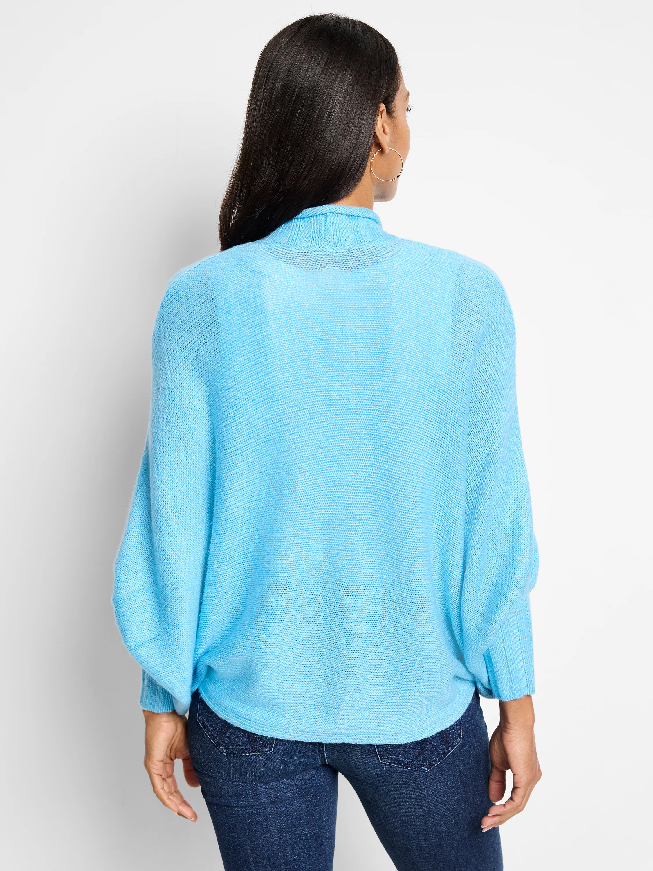 Light blue knit cardigan, mock neck, long sleeves, relaxed fit.