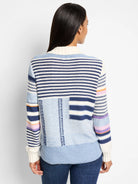 Blue, white, and navy striped sweater jacket with  pastel stripes on sleeves and textured detailing.  Off-white collar.