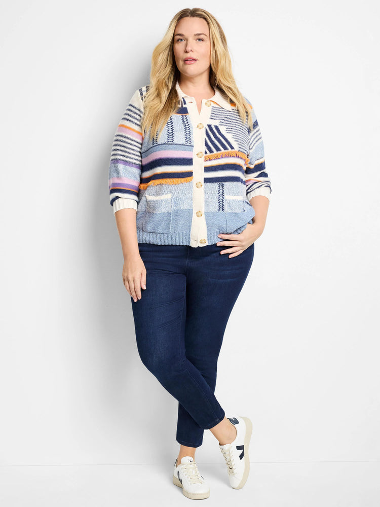 Blue, cream, orange, and purple patterned knit sweater jacket with wooden buttons and patch pockets. Three-quarter sleeves.