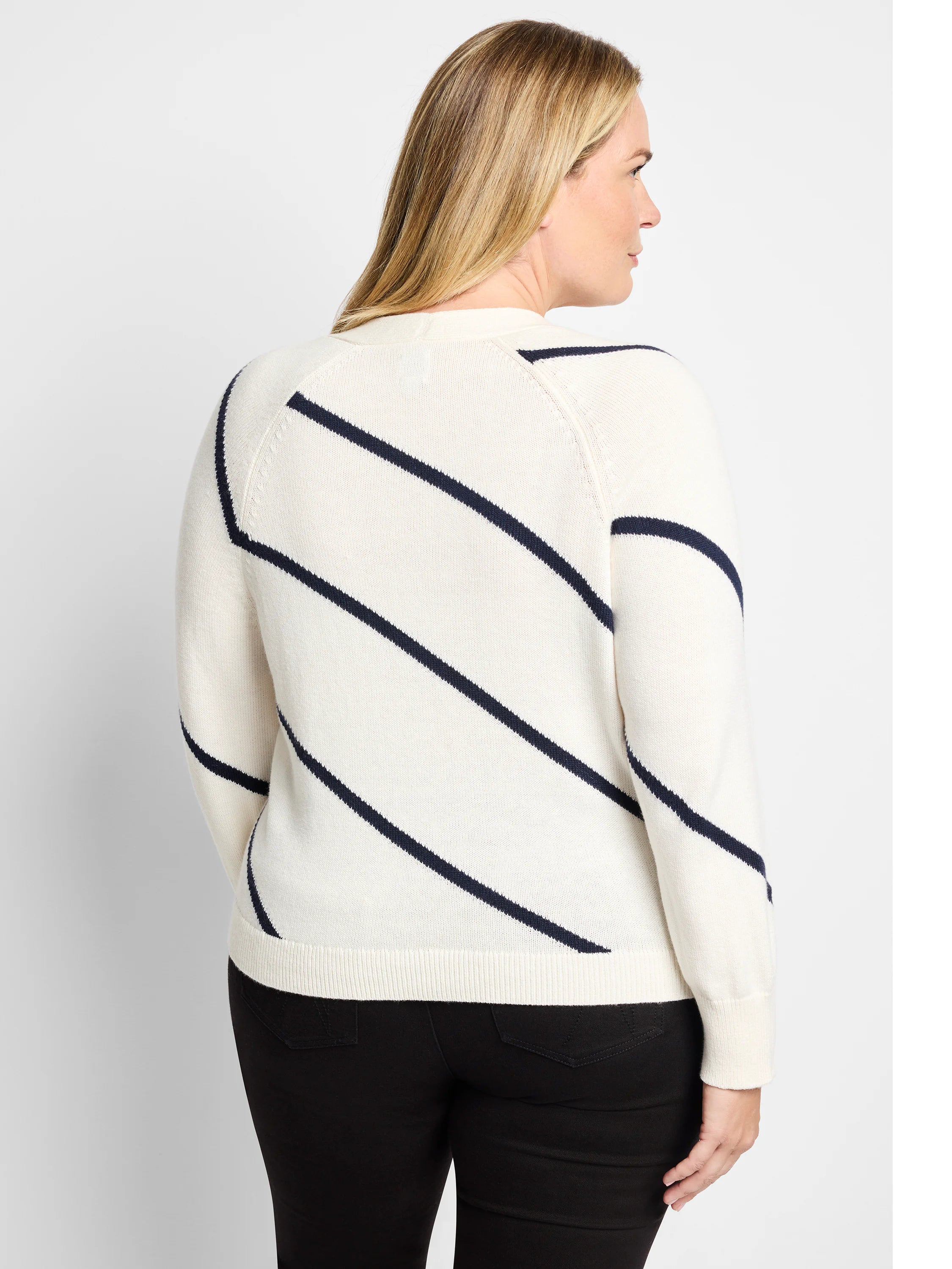 Off-white cardigan with diagonal navy stripes.  Long sleeves, ribbed cuffs and hem.