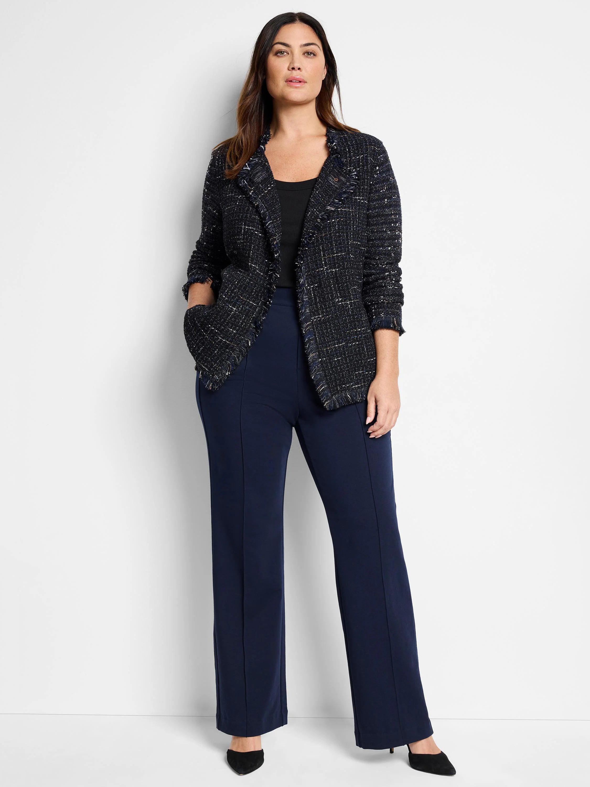 Navy blue tweed jacket with gold and white flecks, fringed edges. Open front.