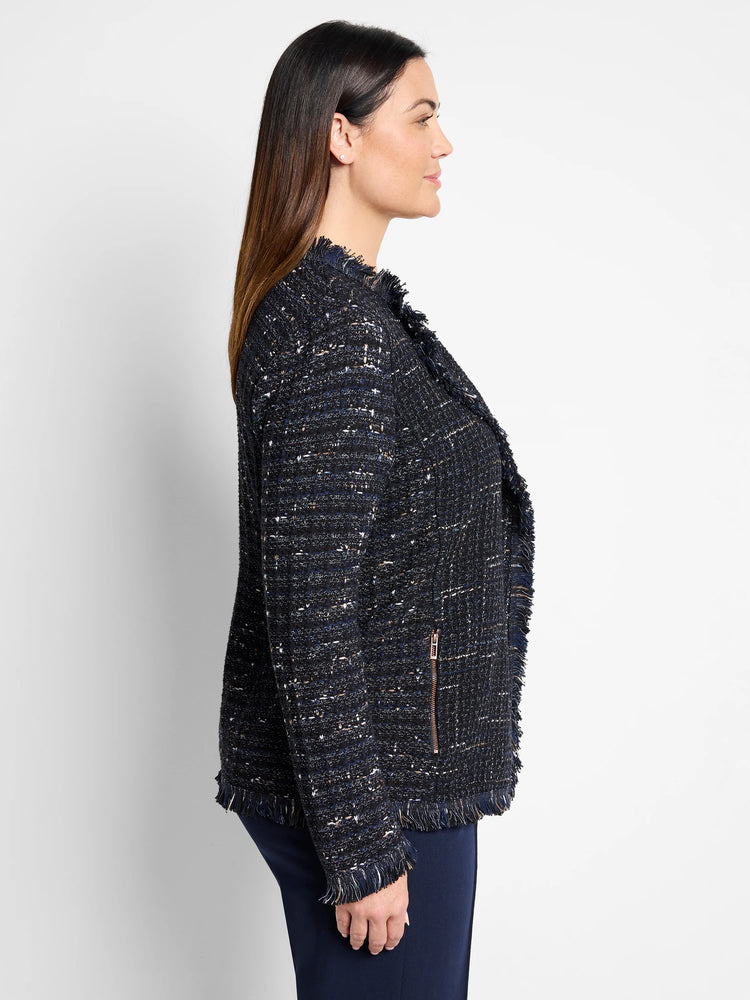 Navy blue tweed jacket with beige and silver flecks. Fringe trim at the hem and neckline. Features a zipper.