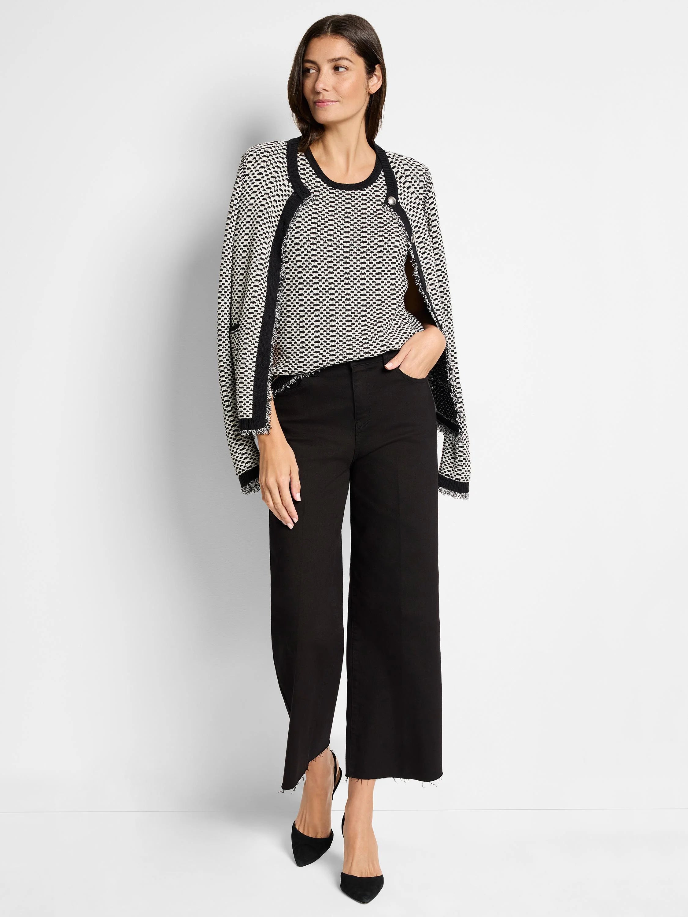 Black and white geometric knit tank; black trim.