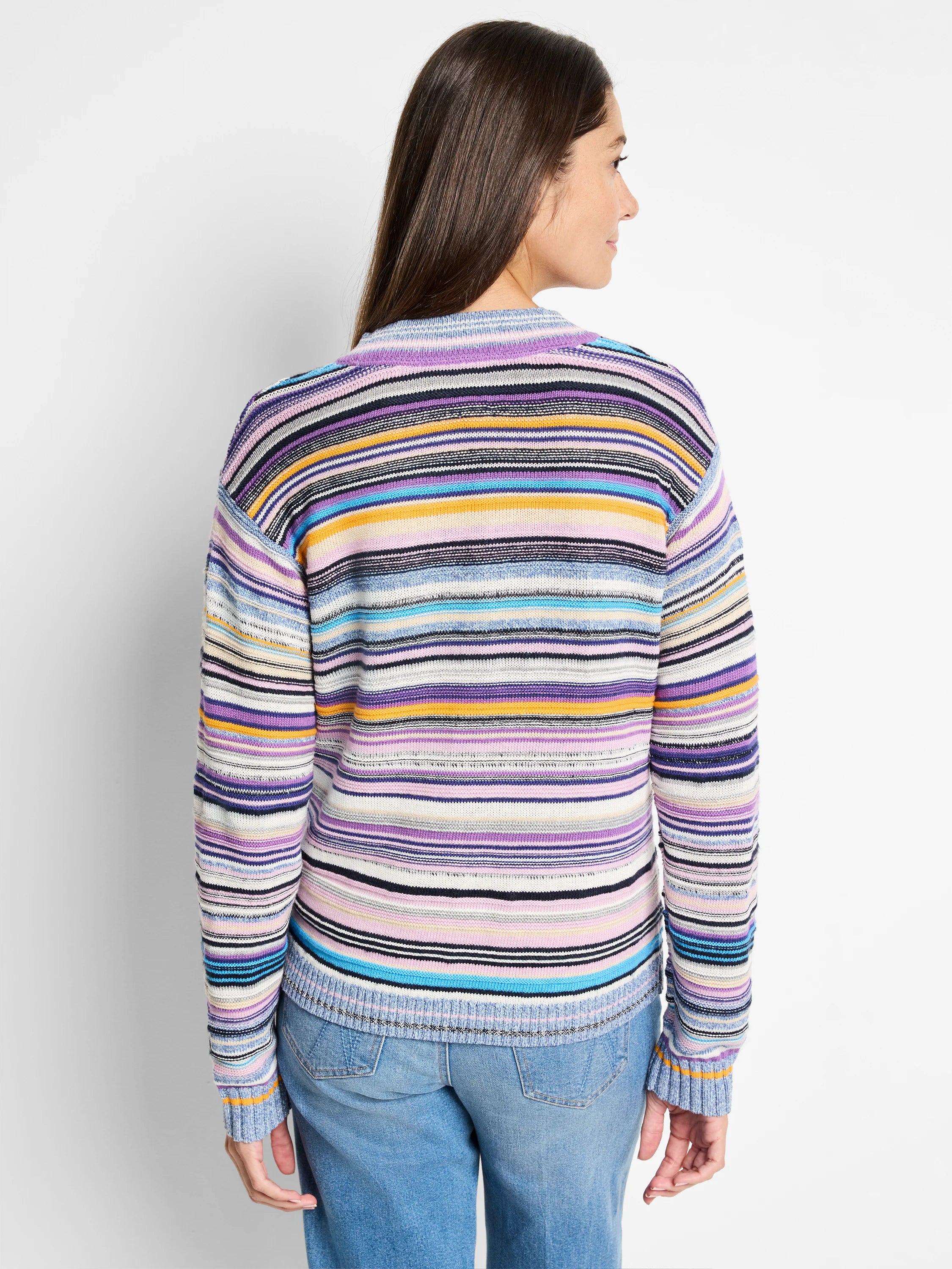 Multicolored striped sweater. Purple, blue, pink, and yellow stripes on a white background. Long sleeves, crew neck.