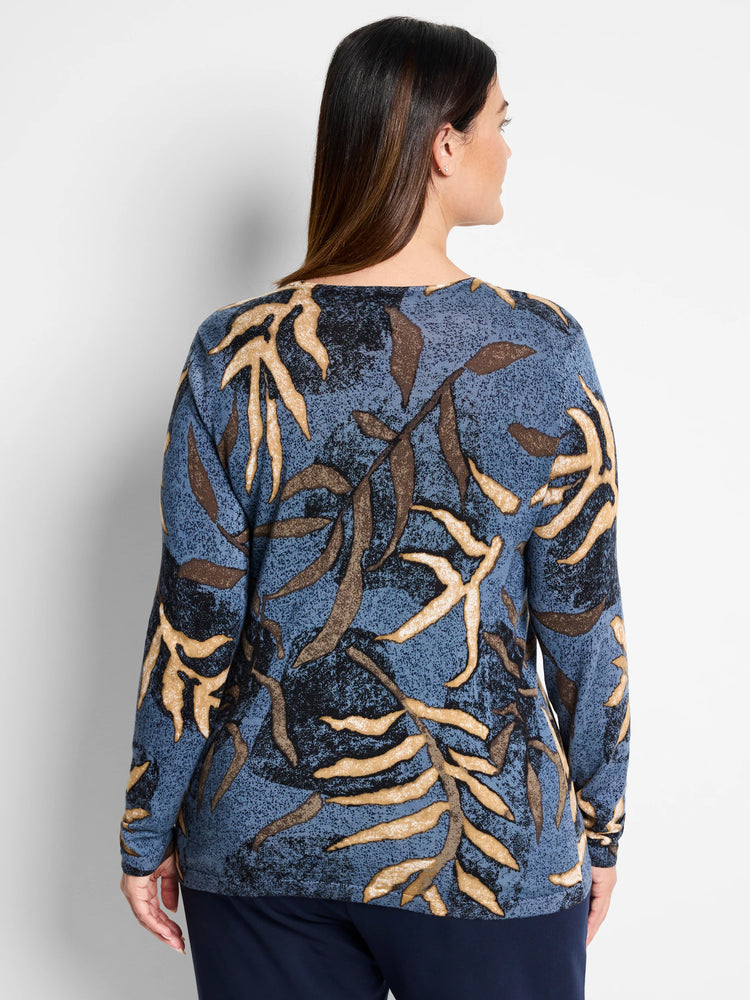 Blue sweater with tan and brown leaf pattern. Long sleeves.