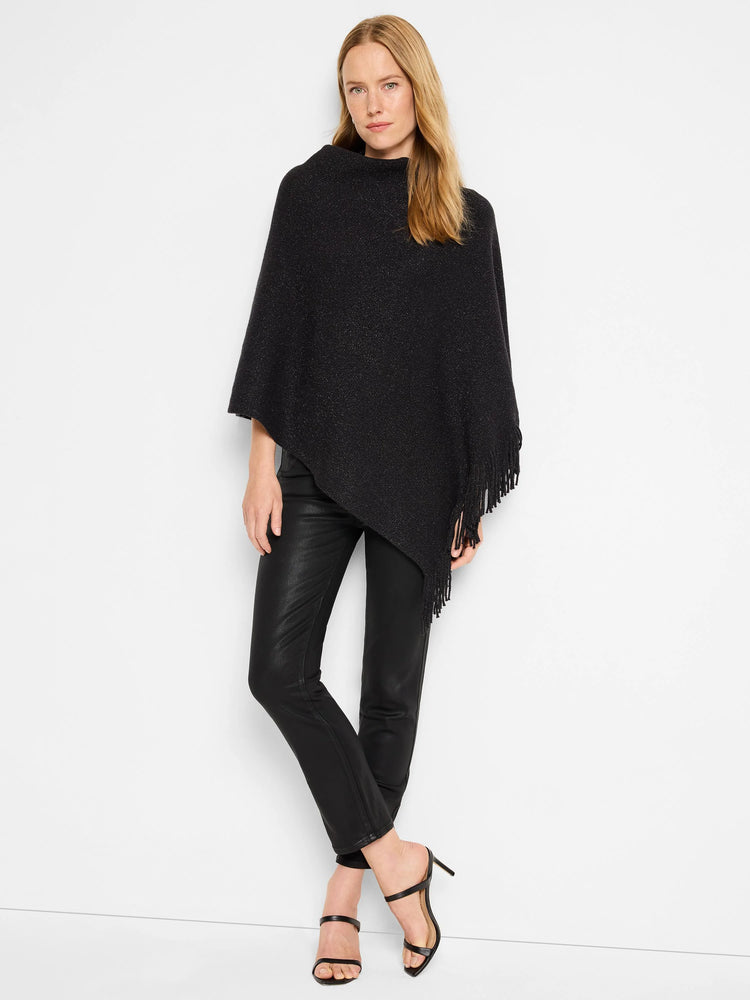 Black poncho with subtle metallic flecks, asymmetrical hem, and fringe trim.