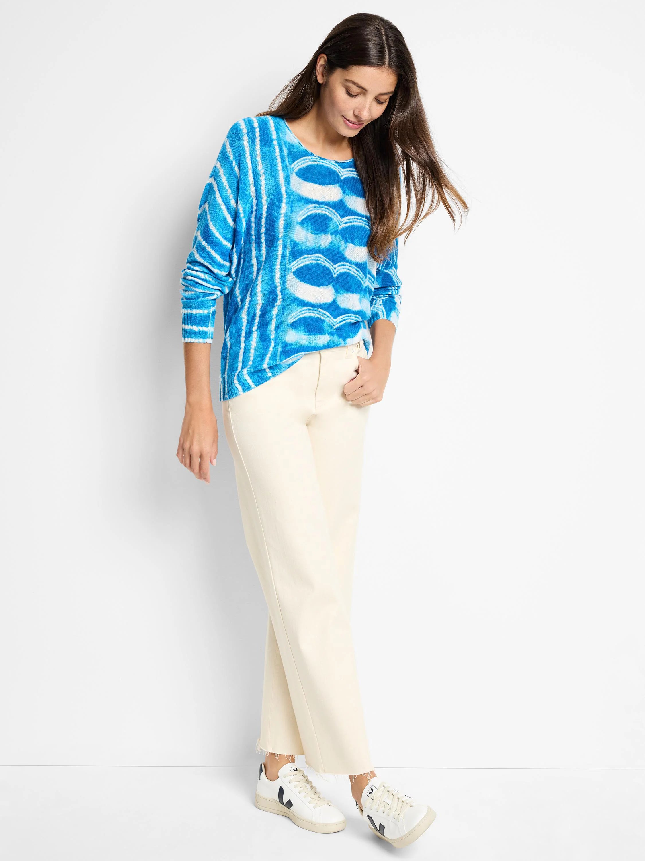 Blue and white tie-dye pattern long-sleeved sweater.