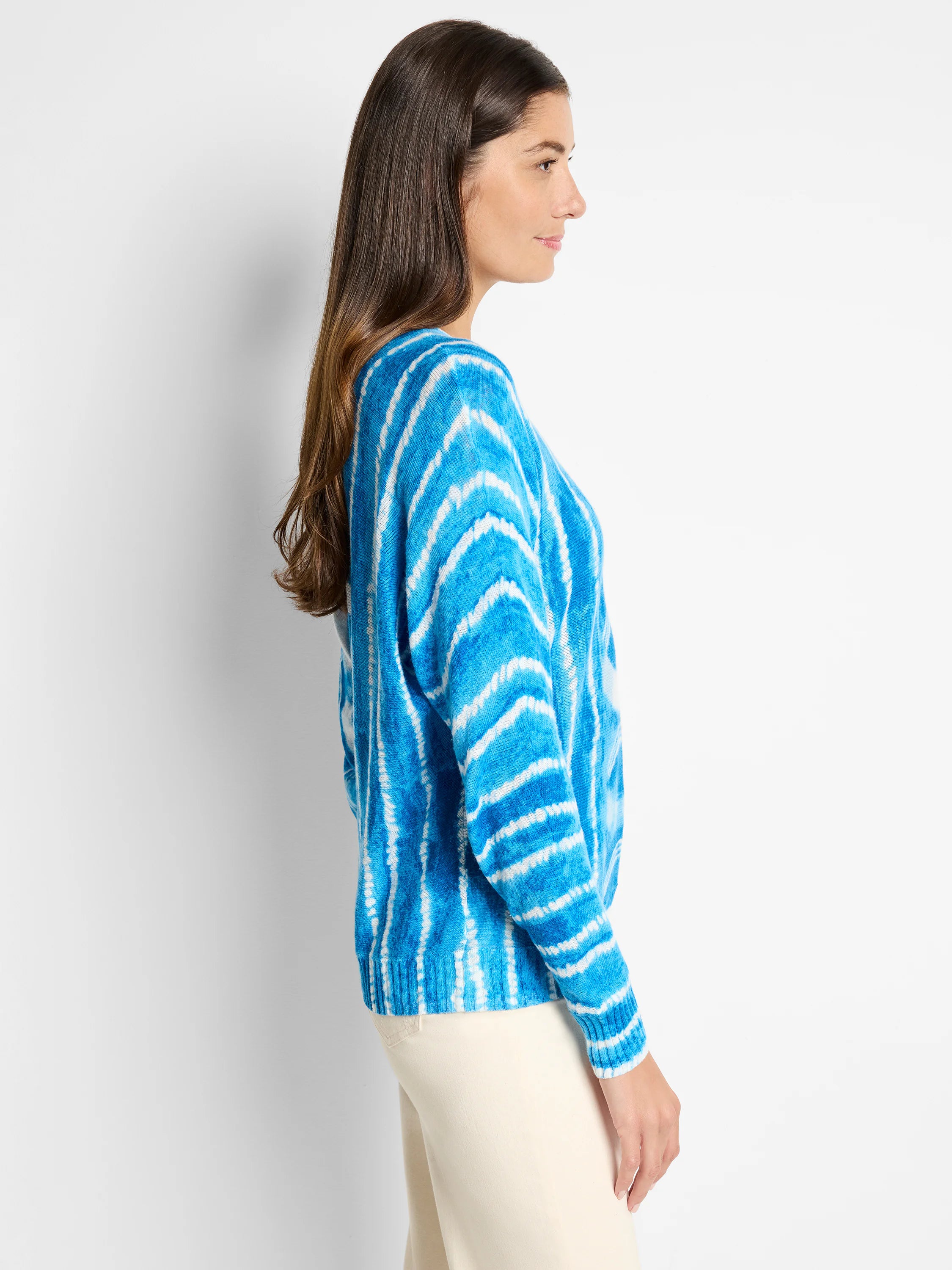 Blue and white tie-dye sweater; horizontal stripes. Long sleeves, relaxed fit.