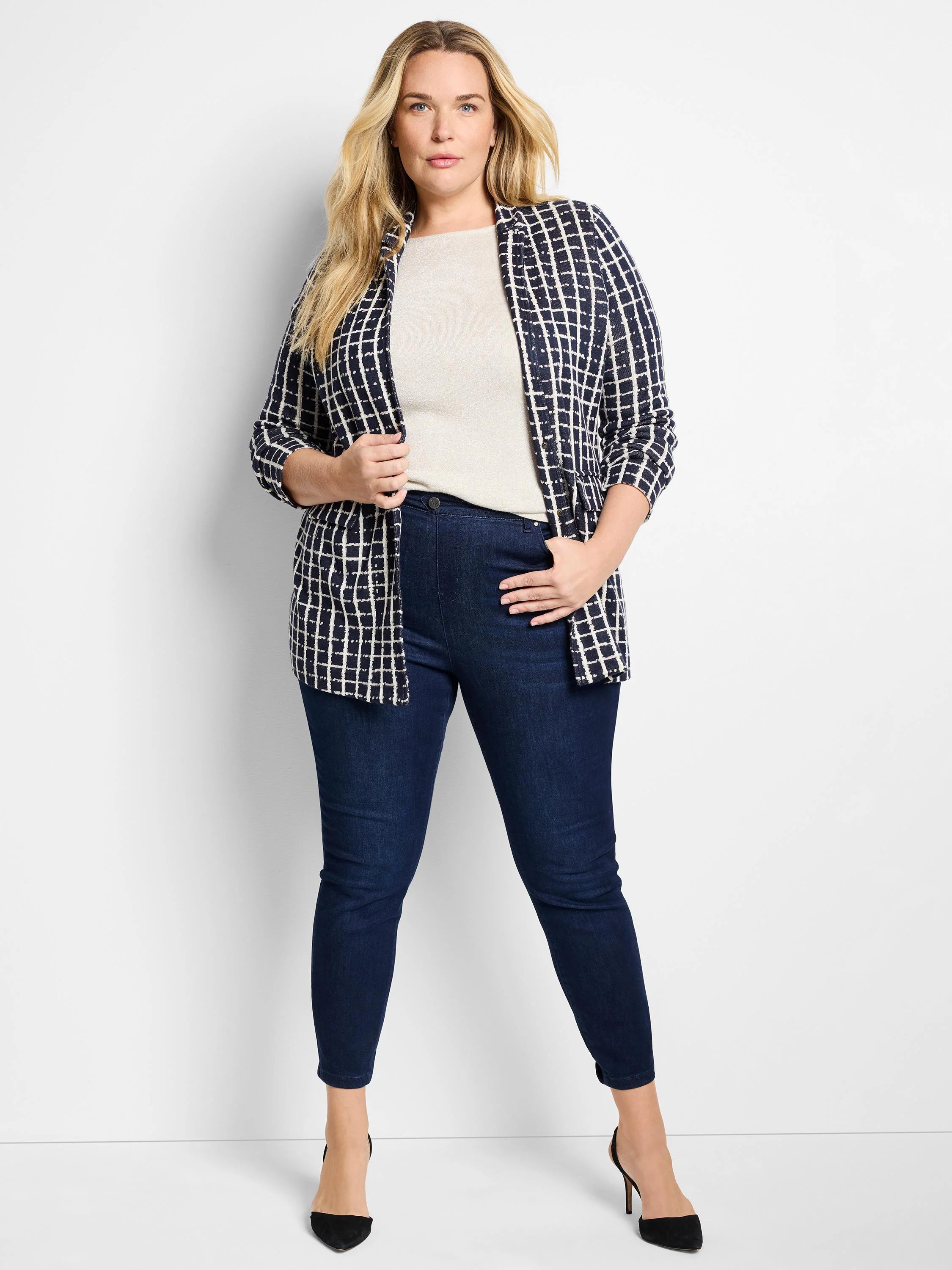 Navy blue blazer with a cream-colored plaid pattern. Open front, three-quarter sleeves.