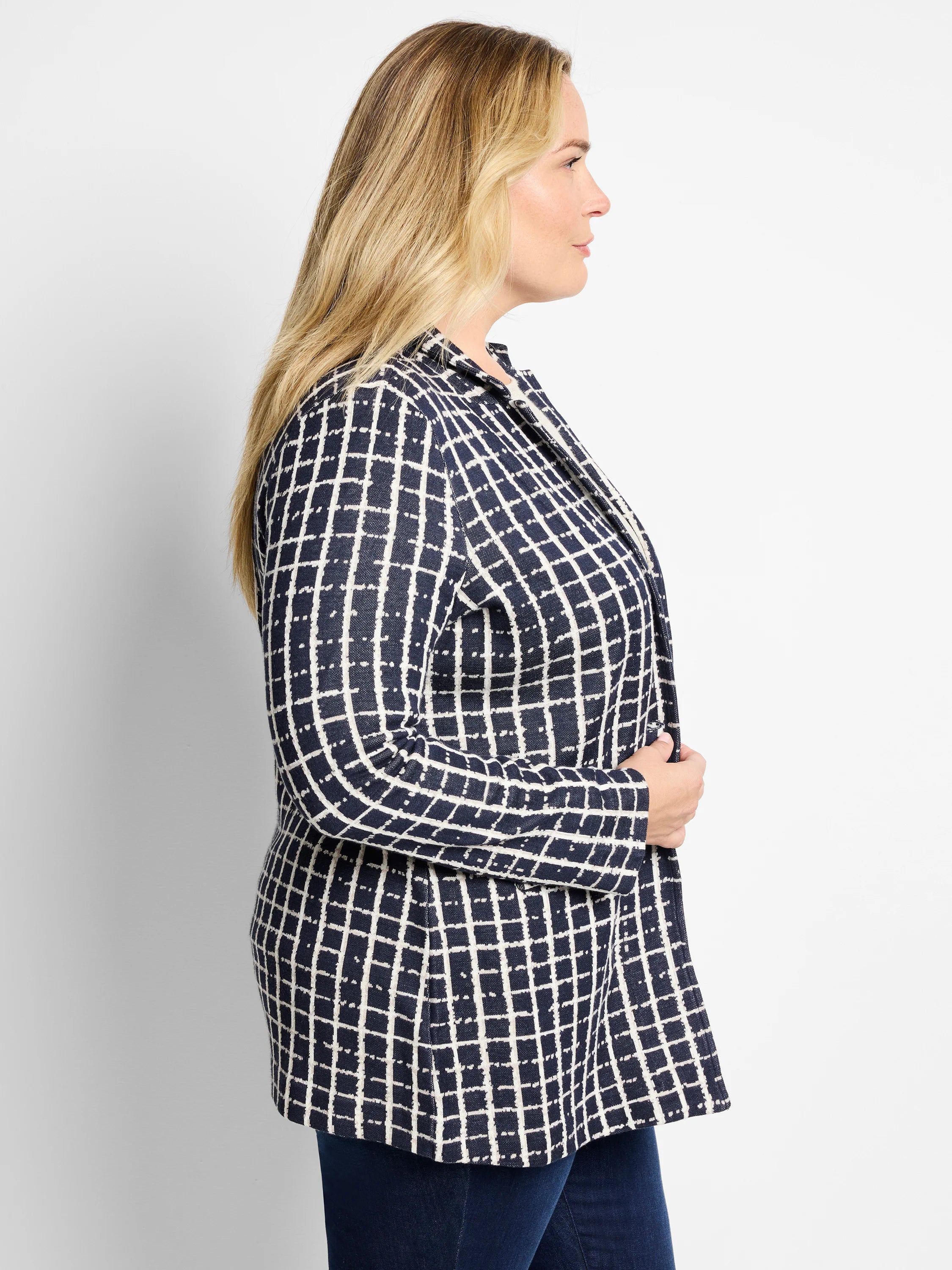 Navy blazer with an off-white plaid pattern. Open front, long sleeves.