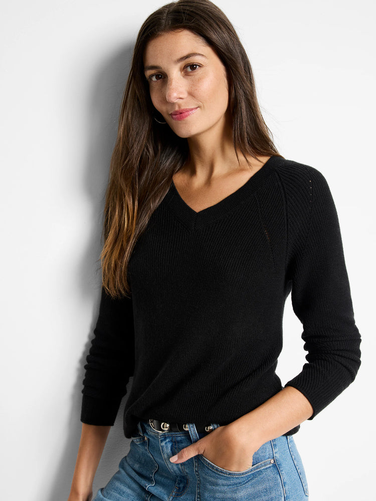 Black, V-neck, long-sleeved ribbed cashmere blend sweater. Raglan sleeves.