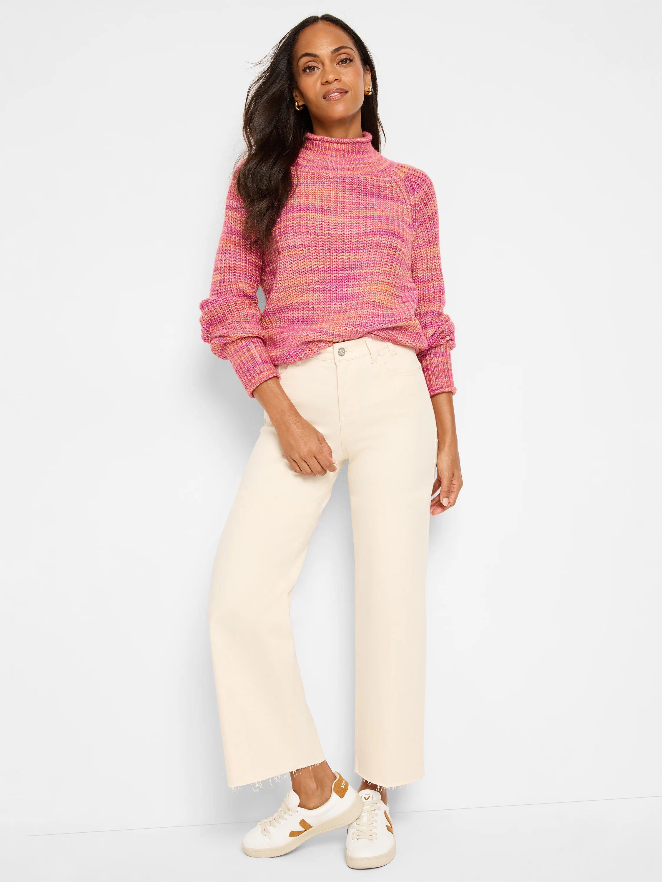 Pink, orange, and yellow horizontal striped knit turtleneck sweater with long sleeves.