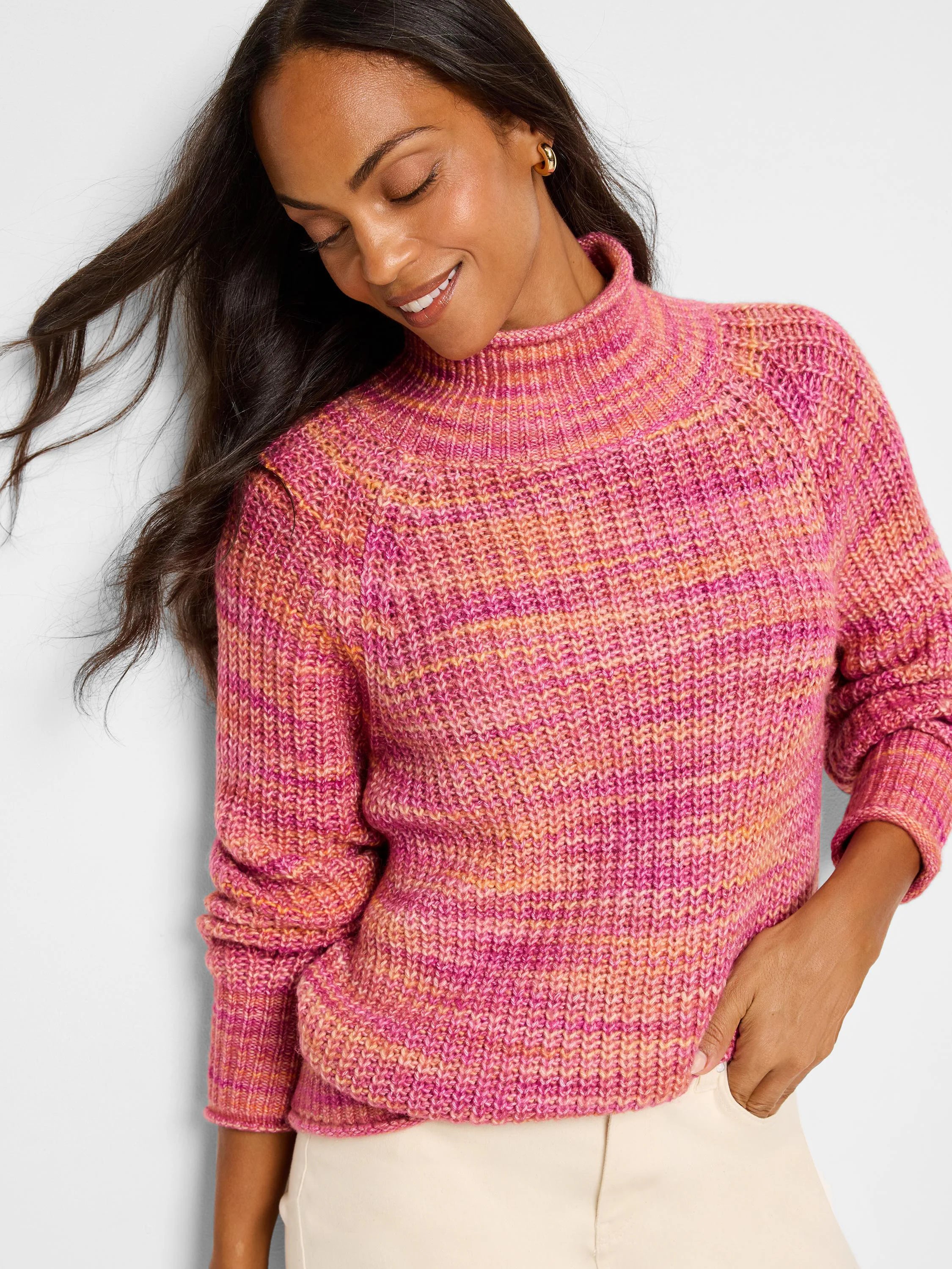 Pink, orange, and peach striped knit sweater. Mock neck, long sleeves.