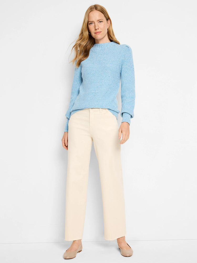 Light blue waffle stitch sweater with long sleeves and a crew neck.
