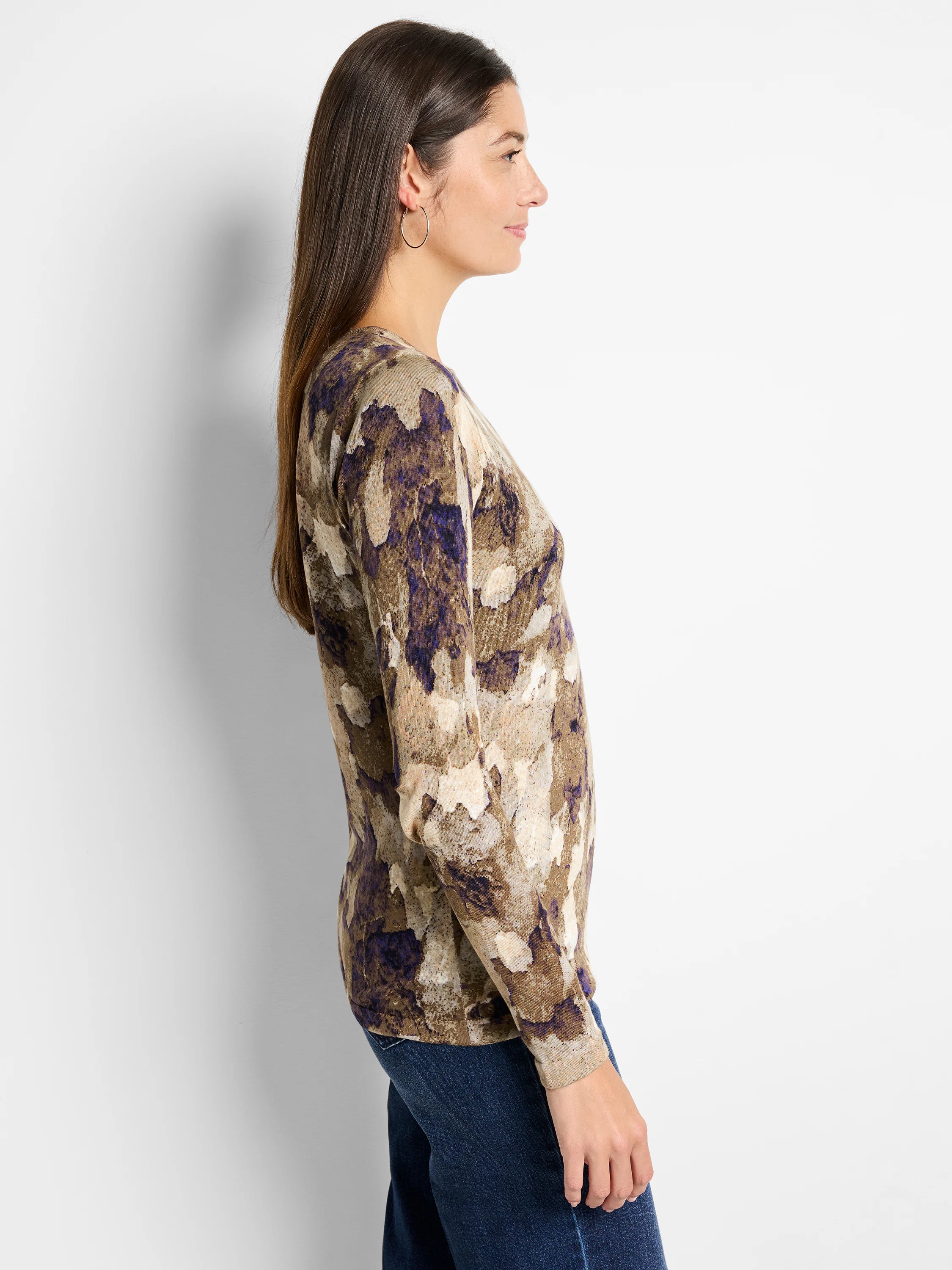 Long-sleeve sweater, side profile. Brown, beige, and purple abstract camo print.