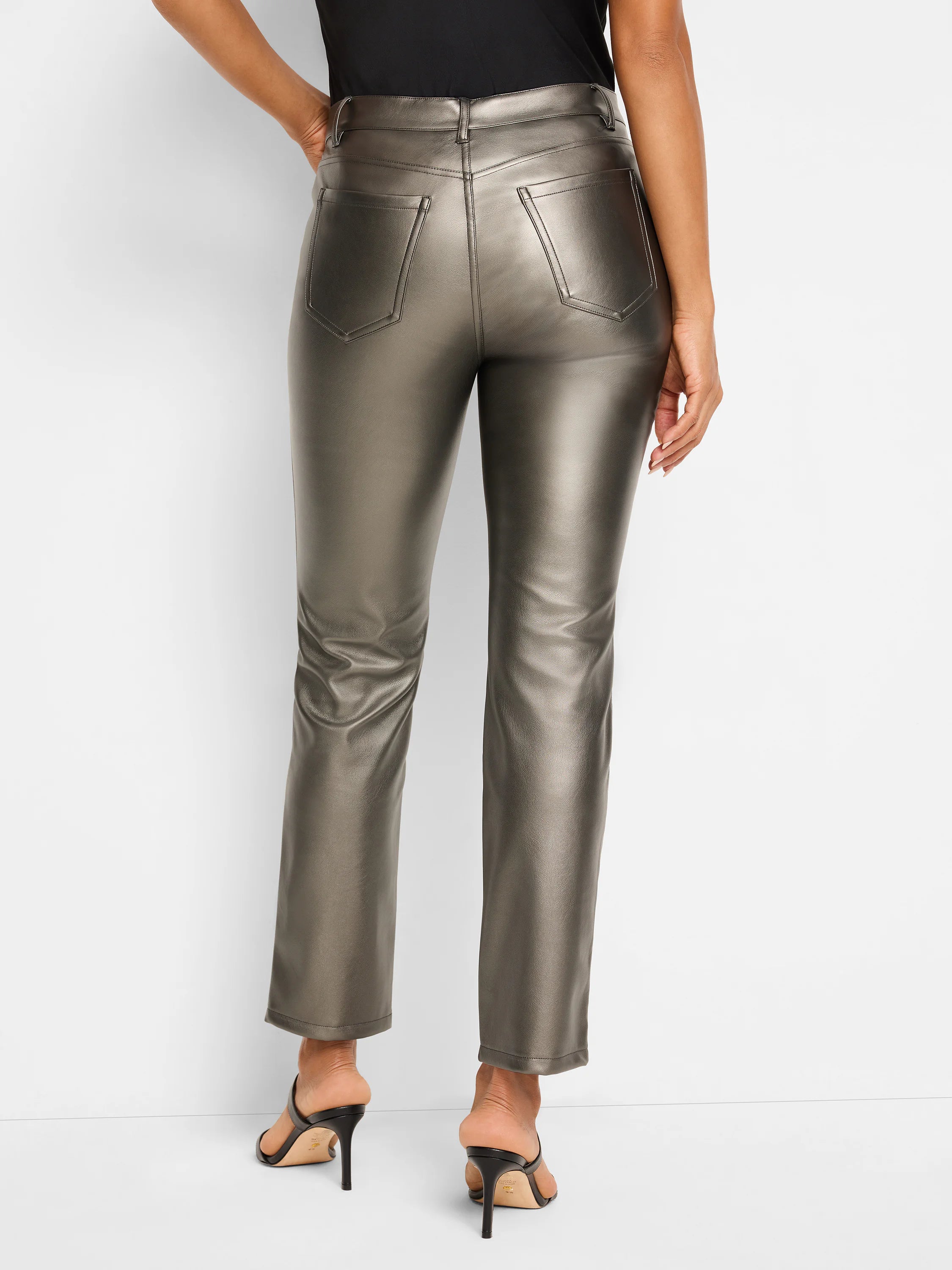Here's alt text that meets the requirements:
Metallic gunmetal gray faux leather pants; straight leg, cropped. Back view.